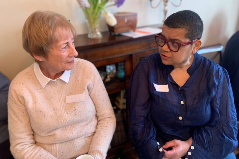 This photograph is of two women talking. It is the header image for the 'one to one support' page on the Urostomy Association's website
