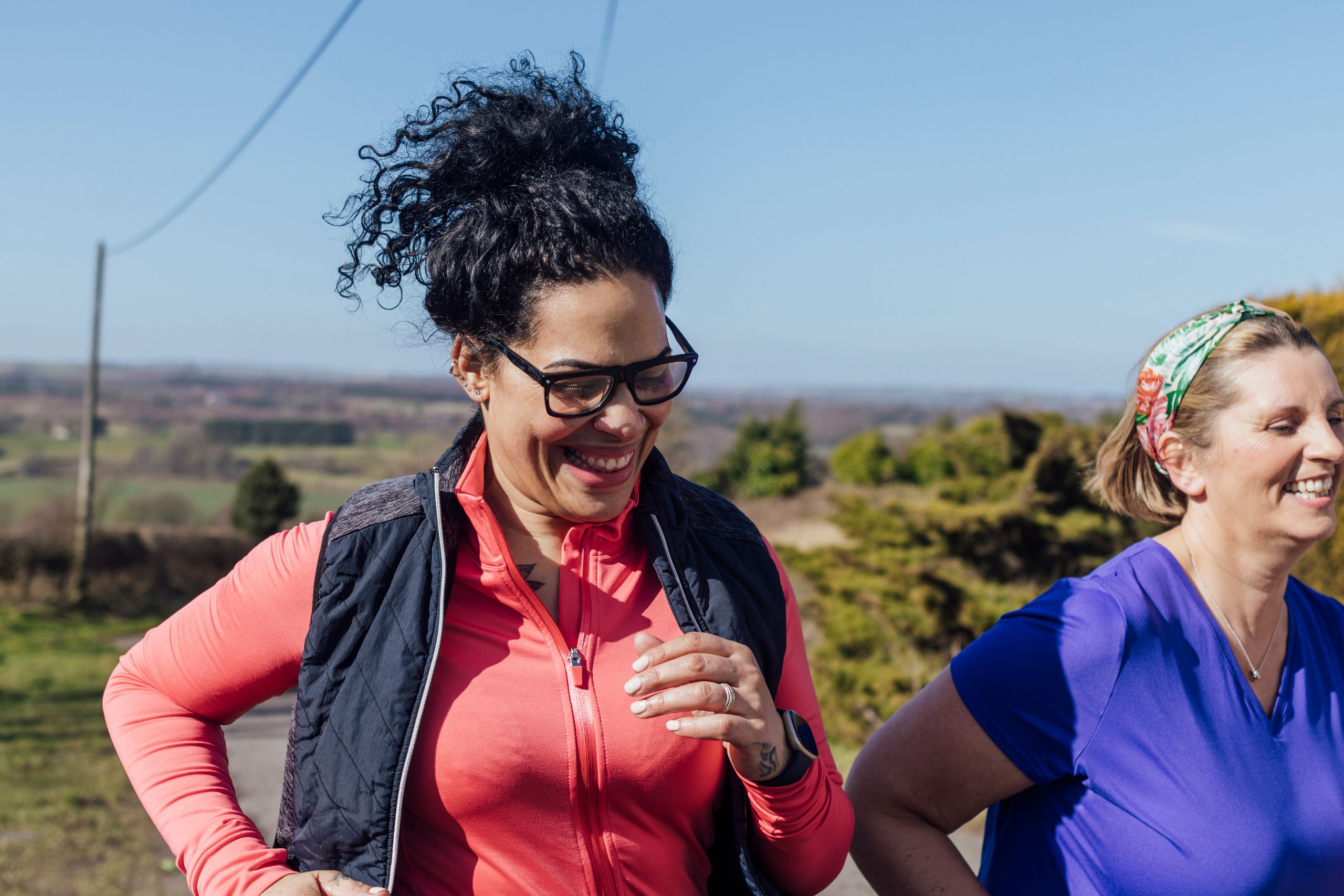 This is a photo of two women jogging. It is the header image for the Urostomy Association's 'fundraise for us' page.