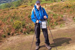This is a photo of Paul Stewart, a Urostomy Association supporter. He's photographed out on a hill-side walk.