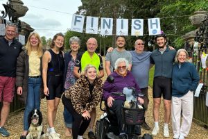 This photo is of Richard Bragg and his family after completing a 60k triathlon in aid of the Urostomy Association to celebrate his 60th birthday