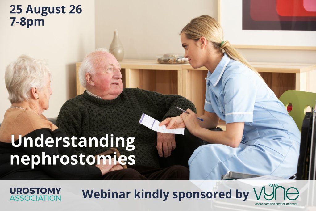 This photo shows an older couple sitting on the sofa at home. A nurse is sitting close by and they are in conversation